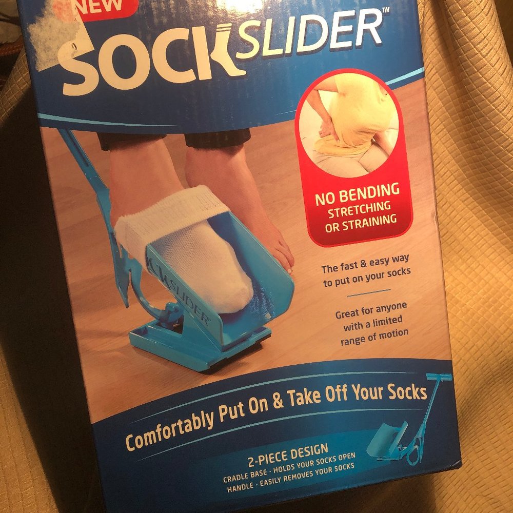 Sock slider new in box, light plastic with a slide